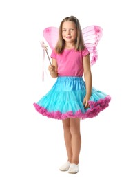 Photo of Cute little girl in fairy costume with pink wings and magic wand on white background