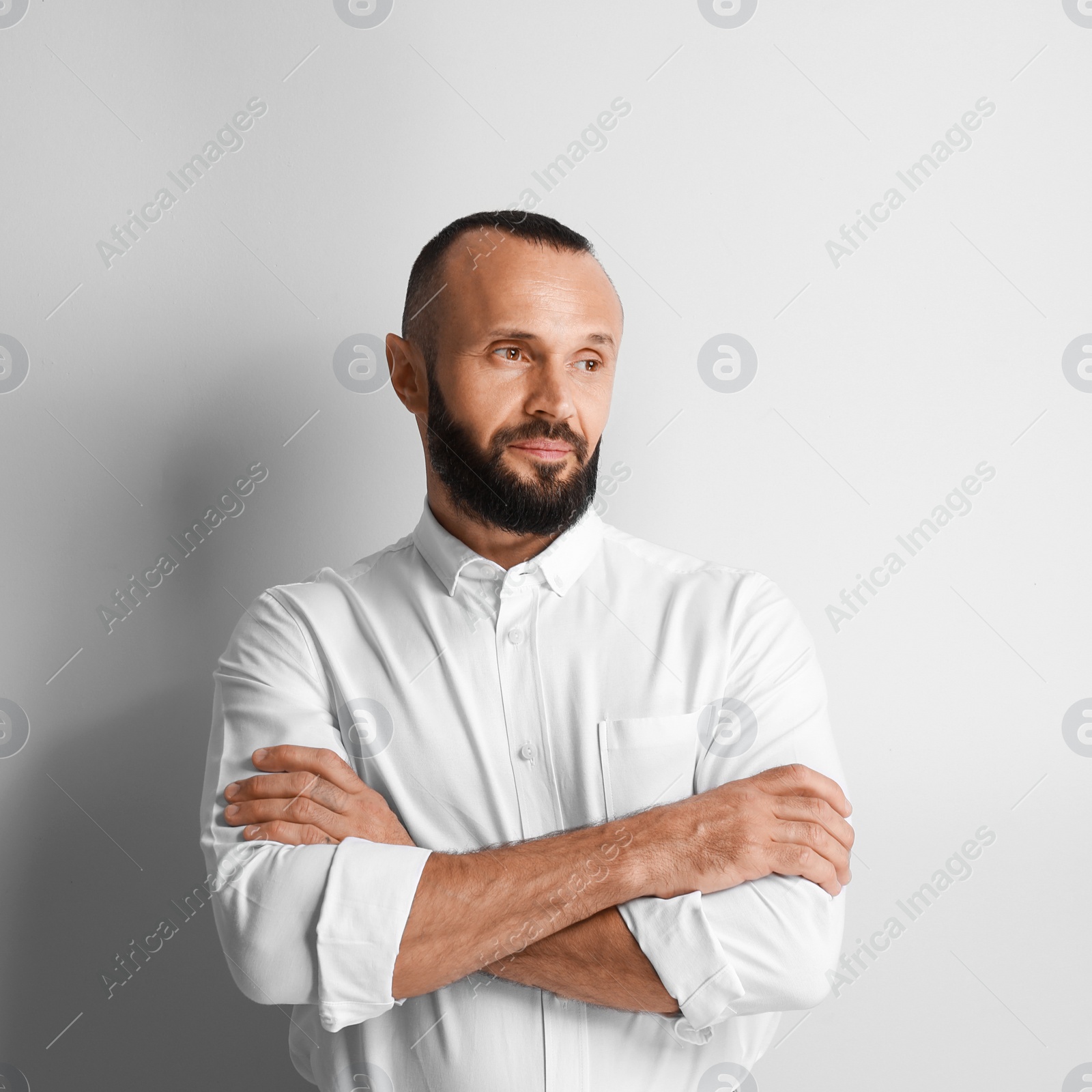 Photo of Portrait of handsome man on white background