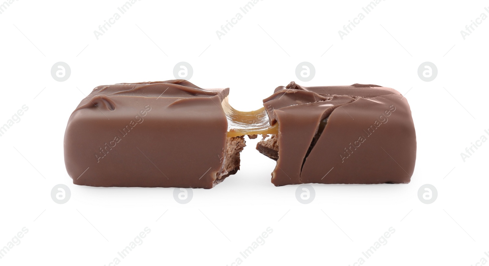 Photo of Pieces of chocolate bar with caramel on white background