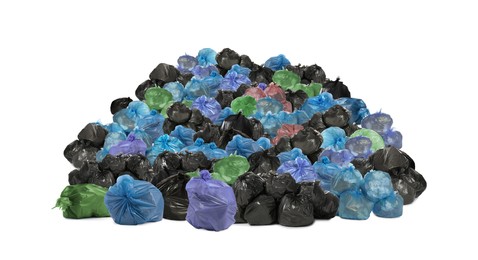 Image of Big heap of trash bags with garbage on white background