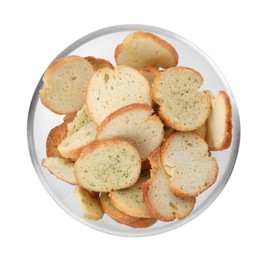 Crispy rusks with seasoning in bowl isolated on white, top view