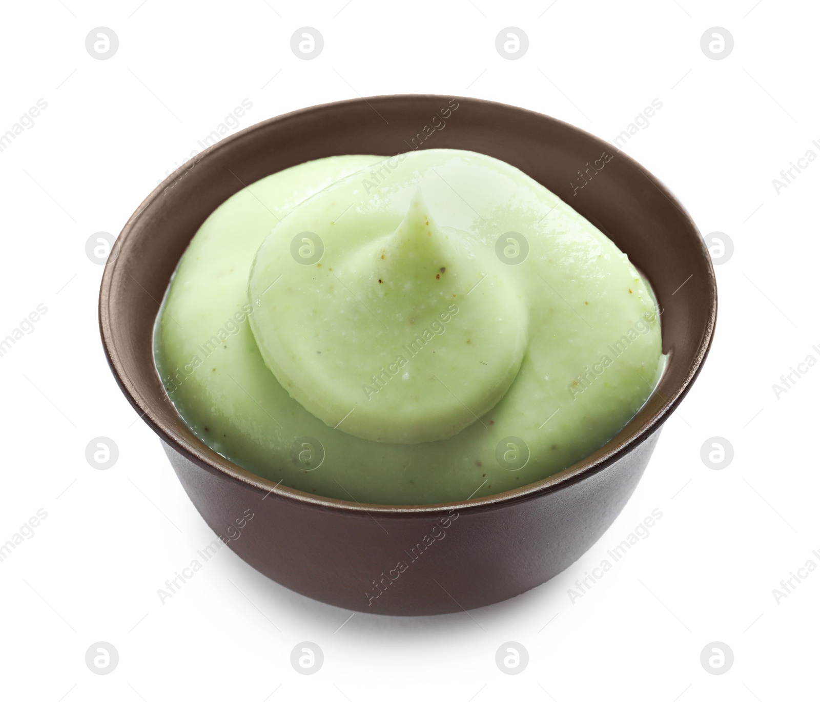 Photo of Bowl with natural scrub on white background