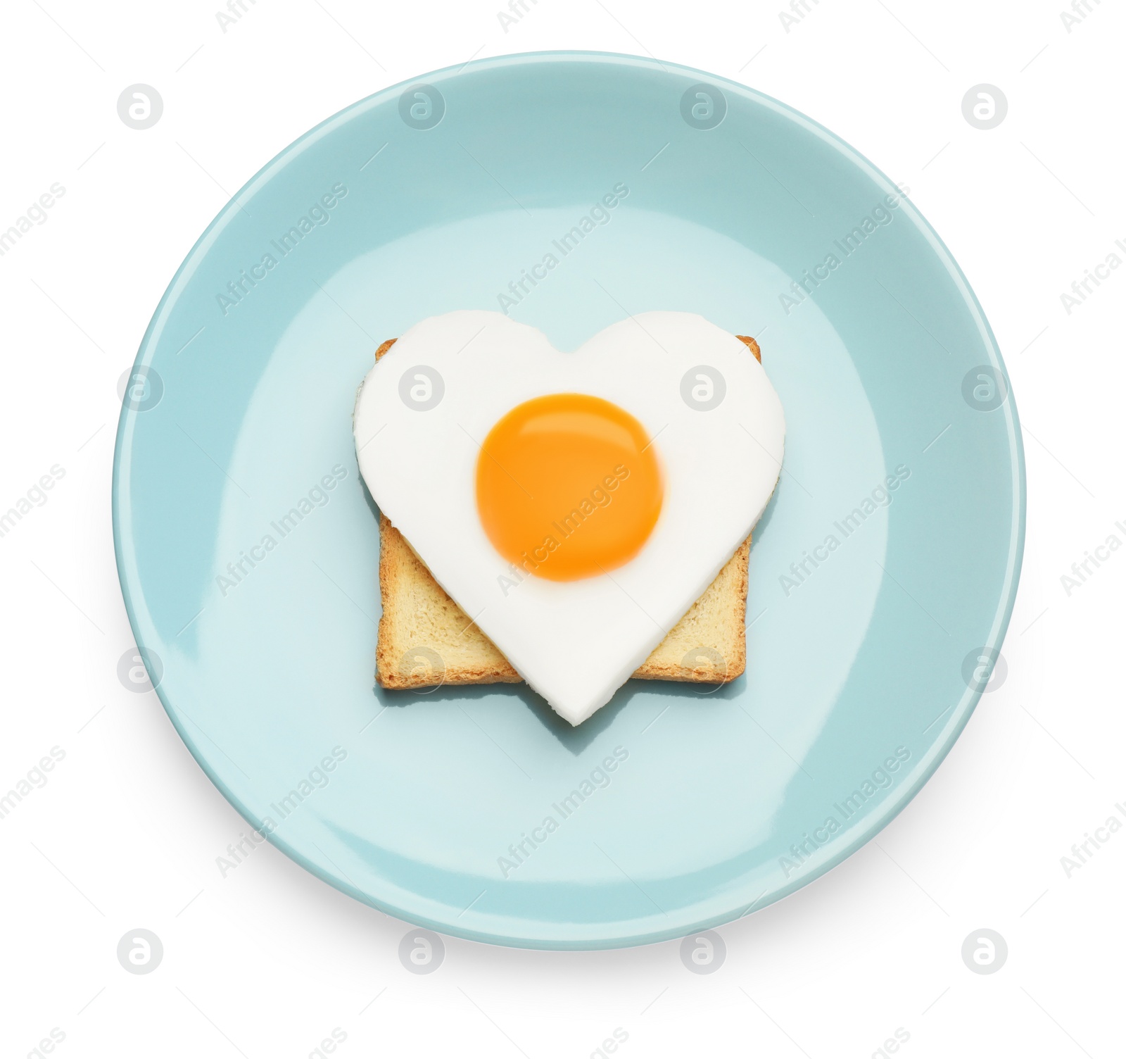 Photo of Plate with tasty fried egg in shape of heart and toast isolated on white, top view