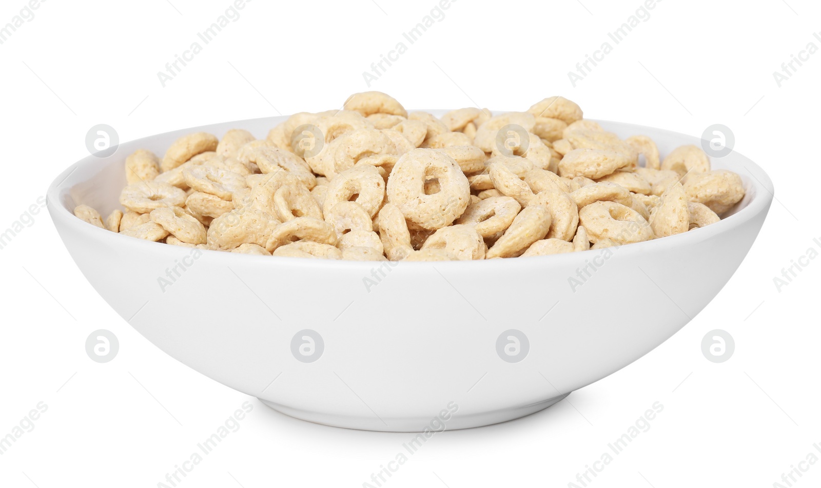 Photo of Tasty cereal rings in bowl isolated on white