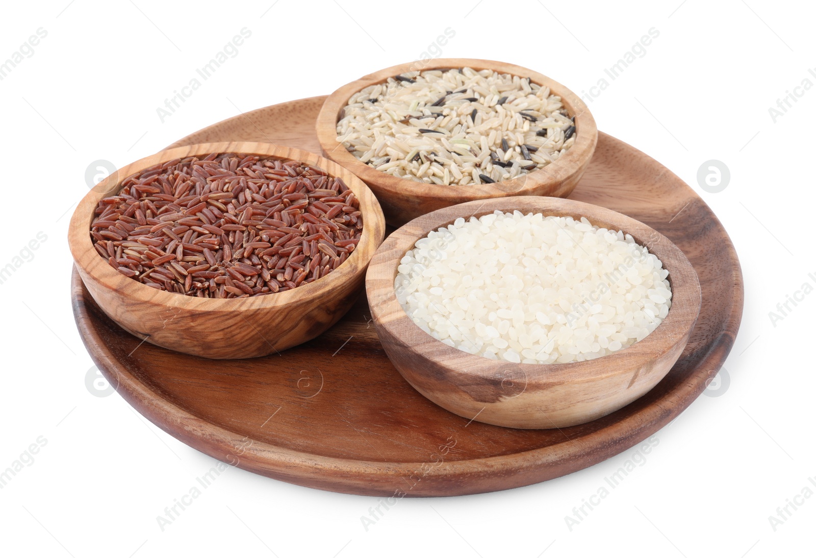 Photo of Bowls with different sorts of rice isolated on white