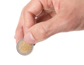 Man holding coin in hand on white background, closeup