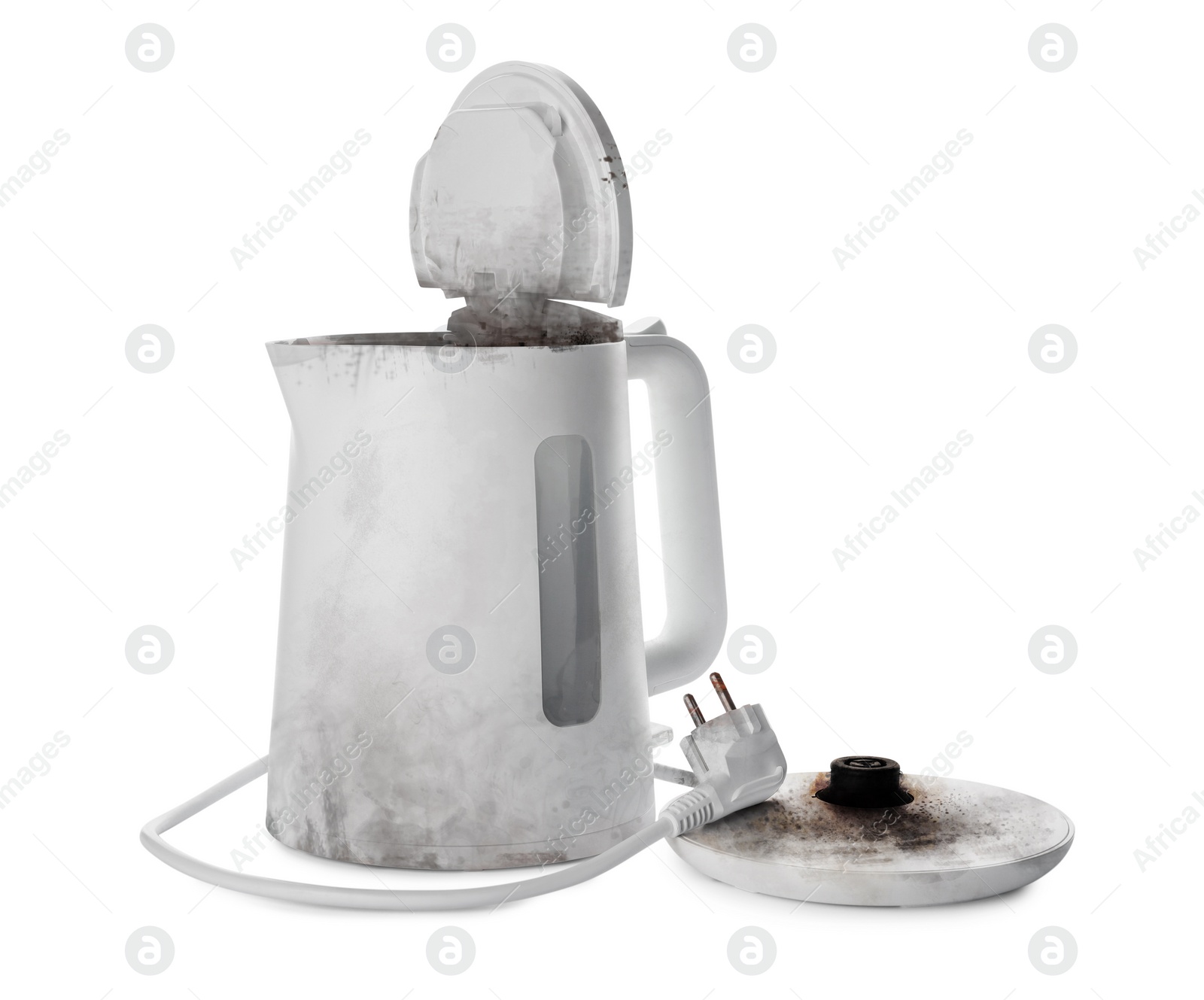 Image of Burnt electric kettle with base and plug on white background