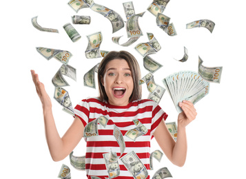 Happy young woman with dollars under money rain on white background