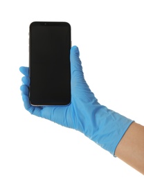 Person in blue latex gloves holding smartphone with blank screen against white background, closeup on hand. Space for design