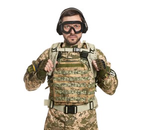 Photo of Soldier in Ukrainian military uniform, tactical goggles and headphones on white background