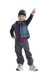 Photo of Happy little boy dancing on white background