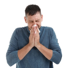 Man suffering from allergy on white background