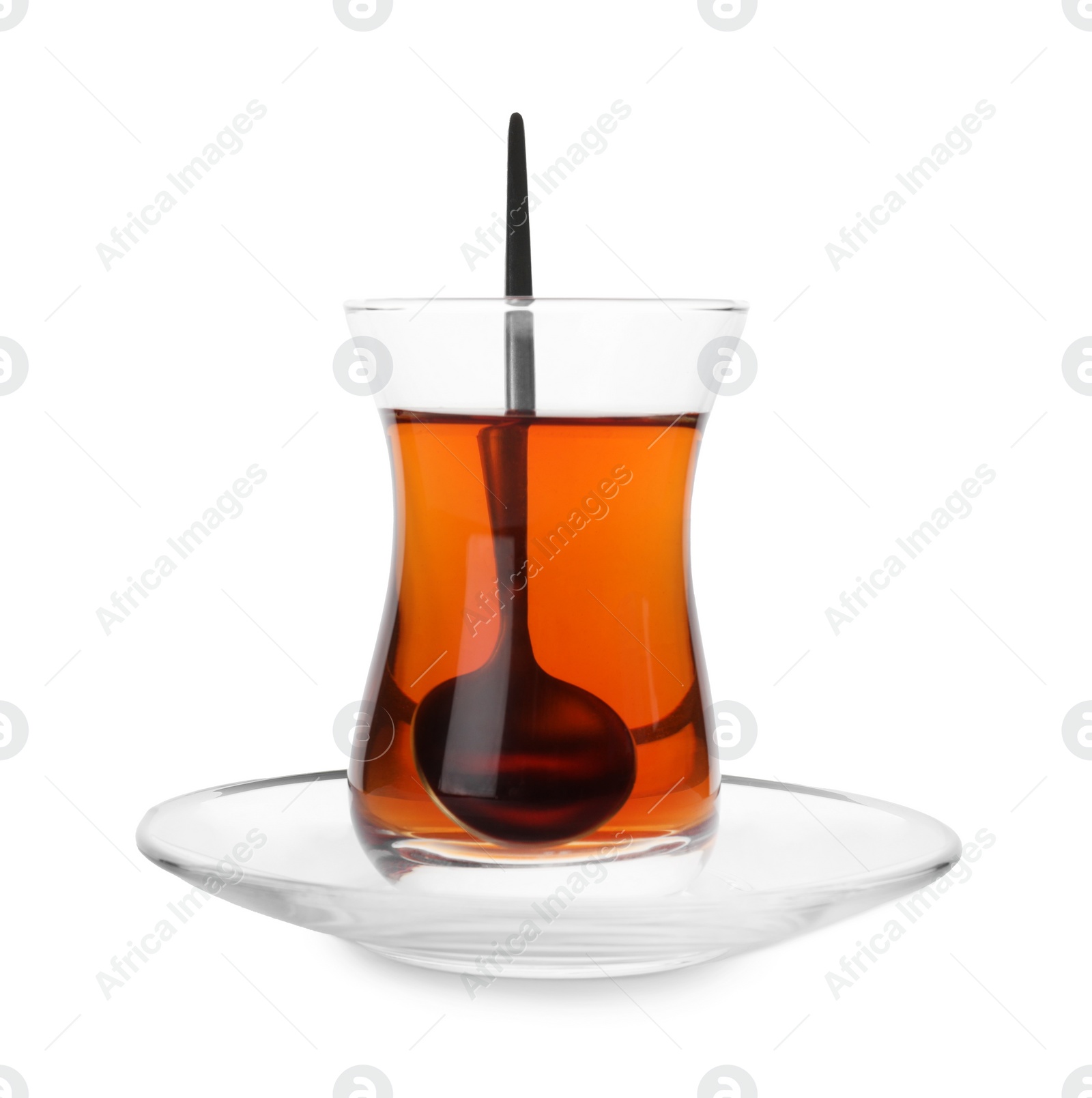 Photo of Tasty Turkish tea in glass isolated on white