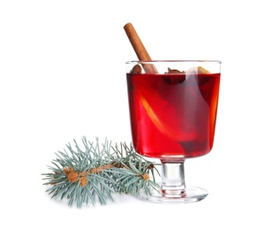 Glass with red mulled wine on white background