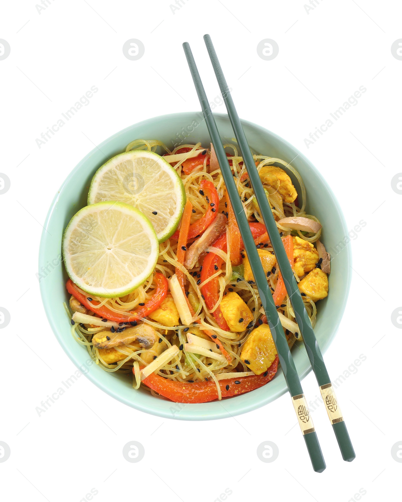 Photo of Stir-fry. Delicious cooked noodles with chicken and vegetables in bowl isolated on white, top view