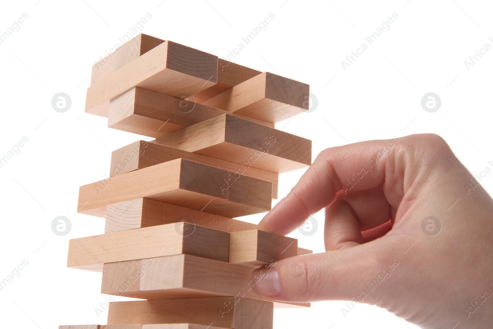 Photo of Woman playing Jenga on white background, closeup