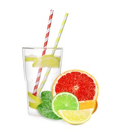 Image of Glass with tasty lemonade, fresh ripe citrus fruits and green leaves on white background