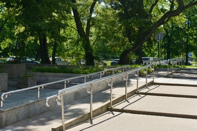 Photo of Outdoor stairs with ramp and metal railings