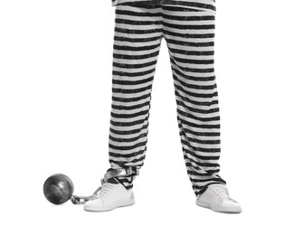 Photo of Prisoner in special uniform with metal ball on white background, closeup
