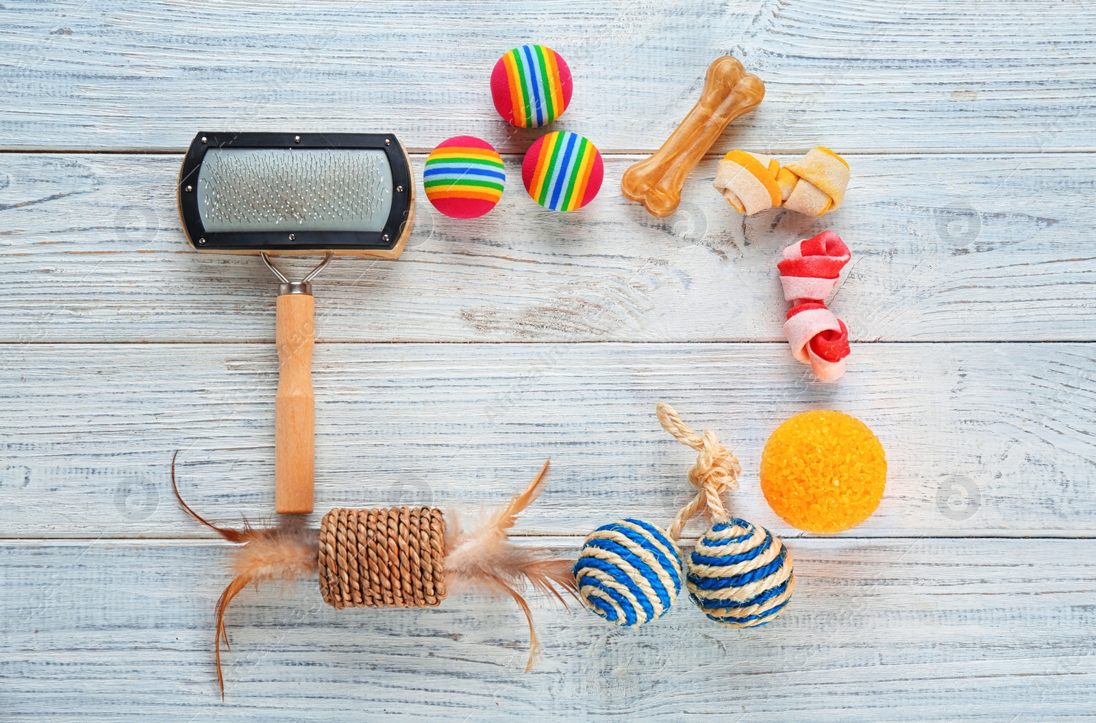 Photo of Cat's accessories on wooden background