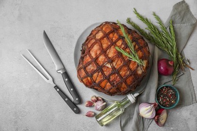 Photo of Delicious baked ham served on light grey table, flat lay