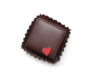 Photo of Delicious dark chocolate candy with little red heart isolated on white, top view