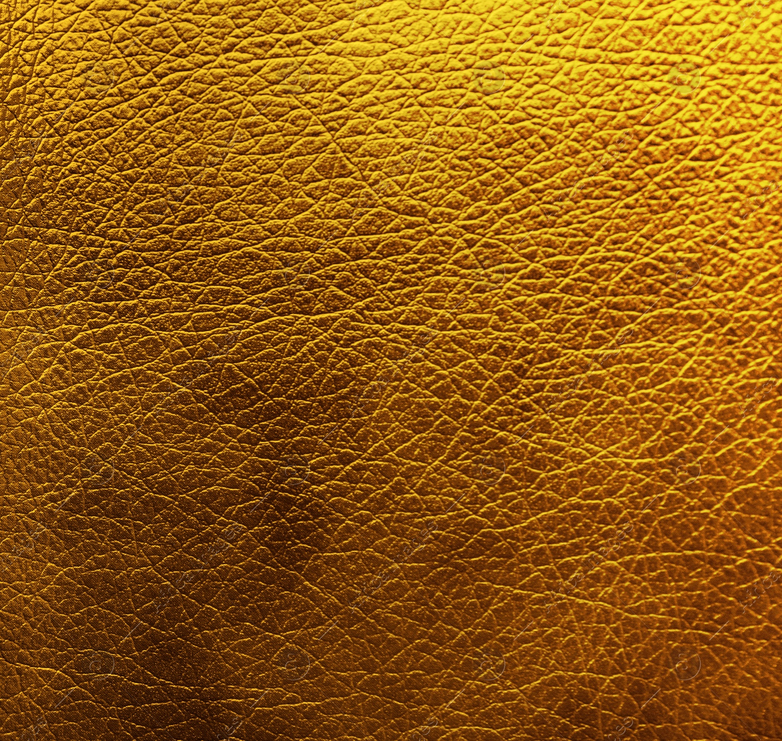 Image of Golden textured surface as background, closeup view