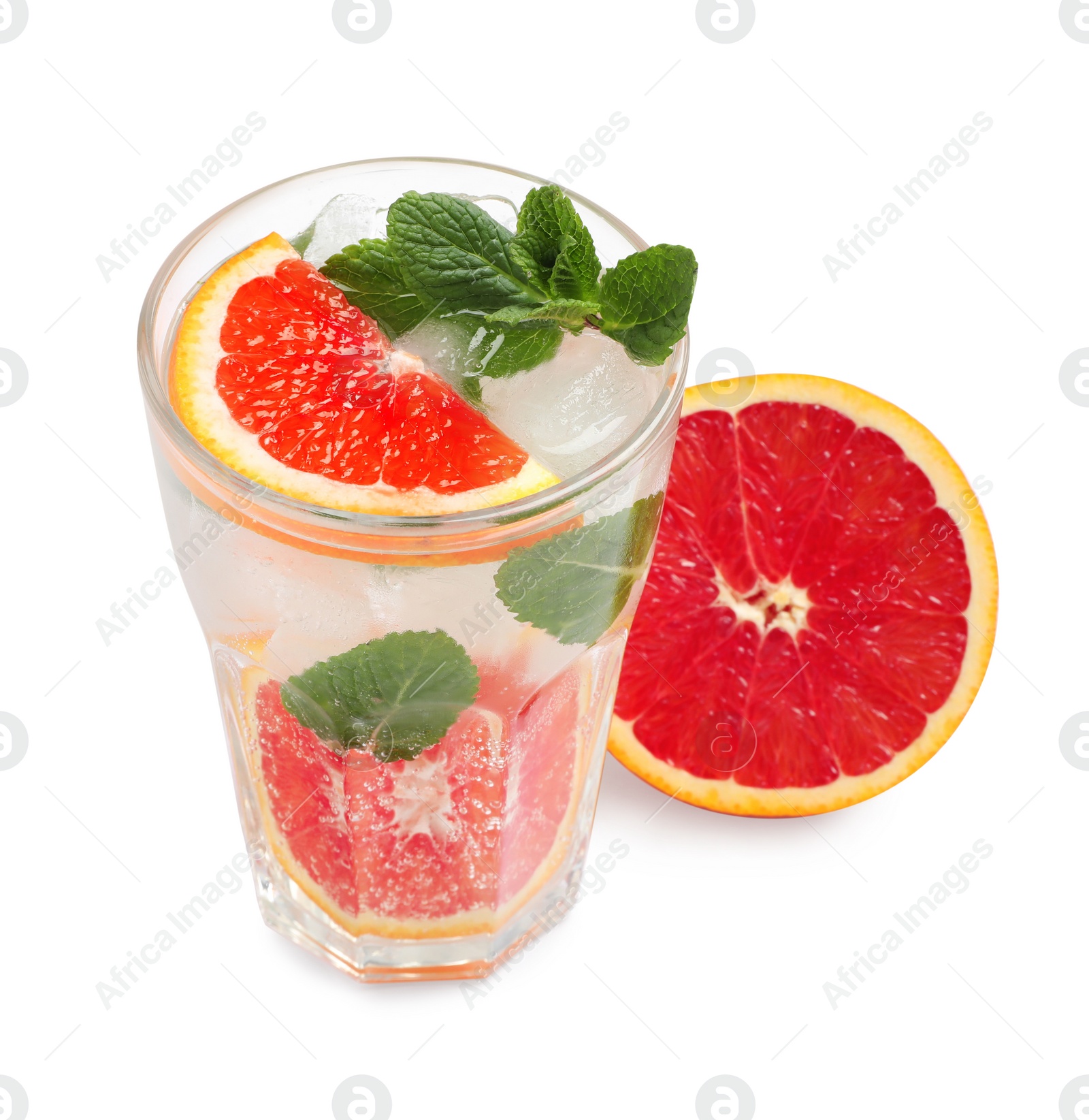 Photo of Delicious refreshing drink with sicilian orange, fresh mint and ice cubes in glass isolated on white