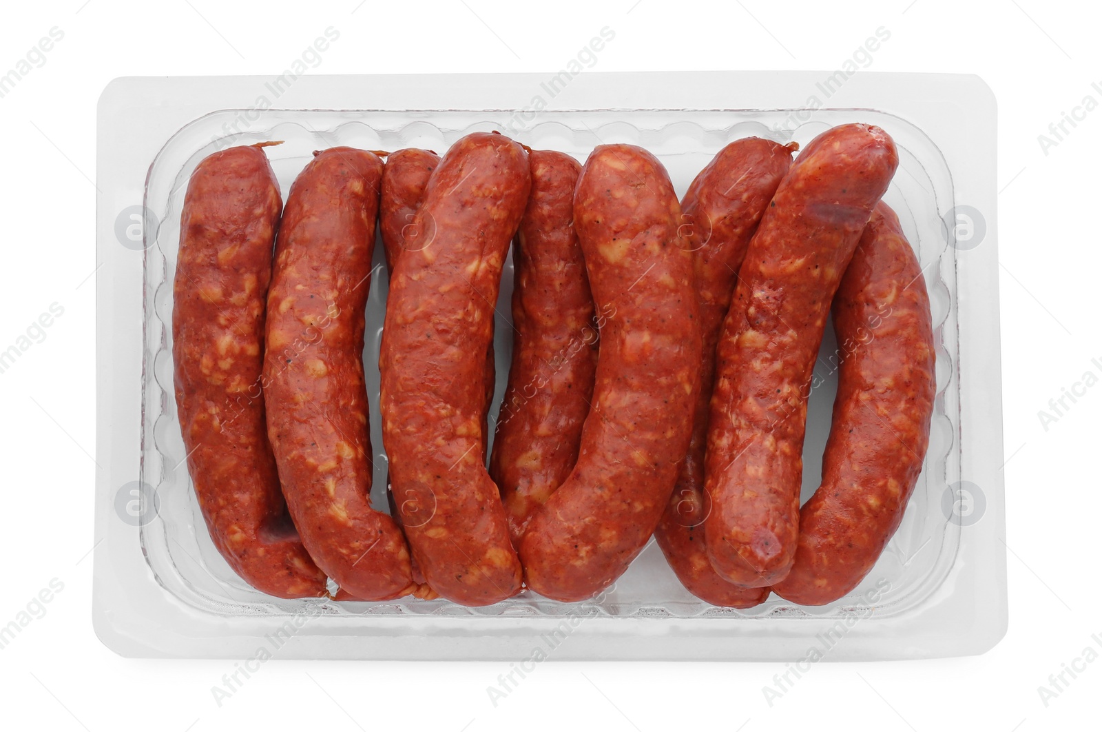 Photo of Plastic container with sausages isolated on white, top view. Meat product