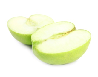 Halves of fresh green apple on white background