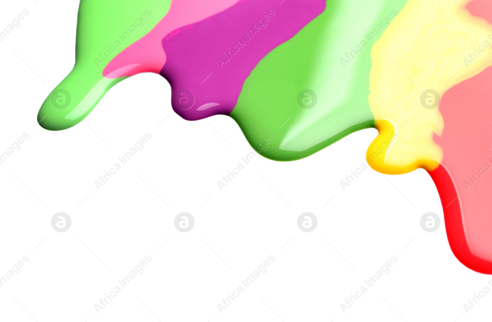 Photo of Colorful nail polishes spilled on white background