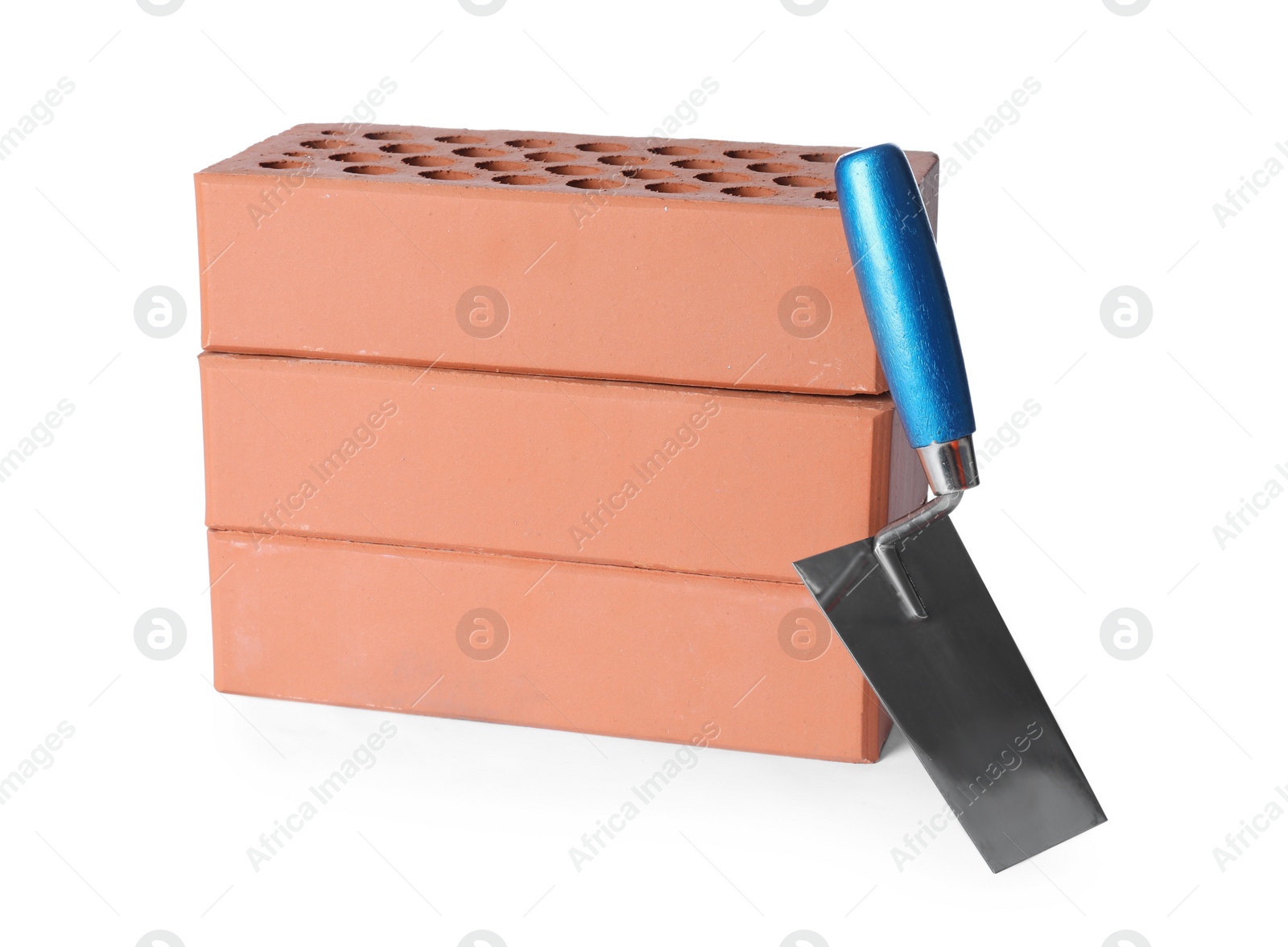 Photo of Red bricks and trowel on white background