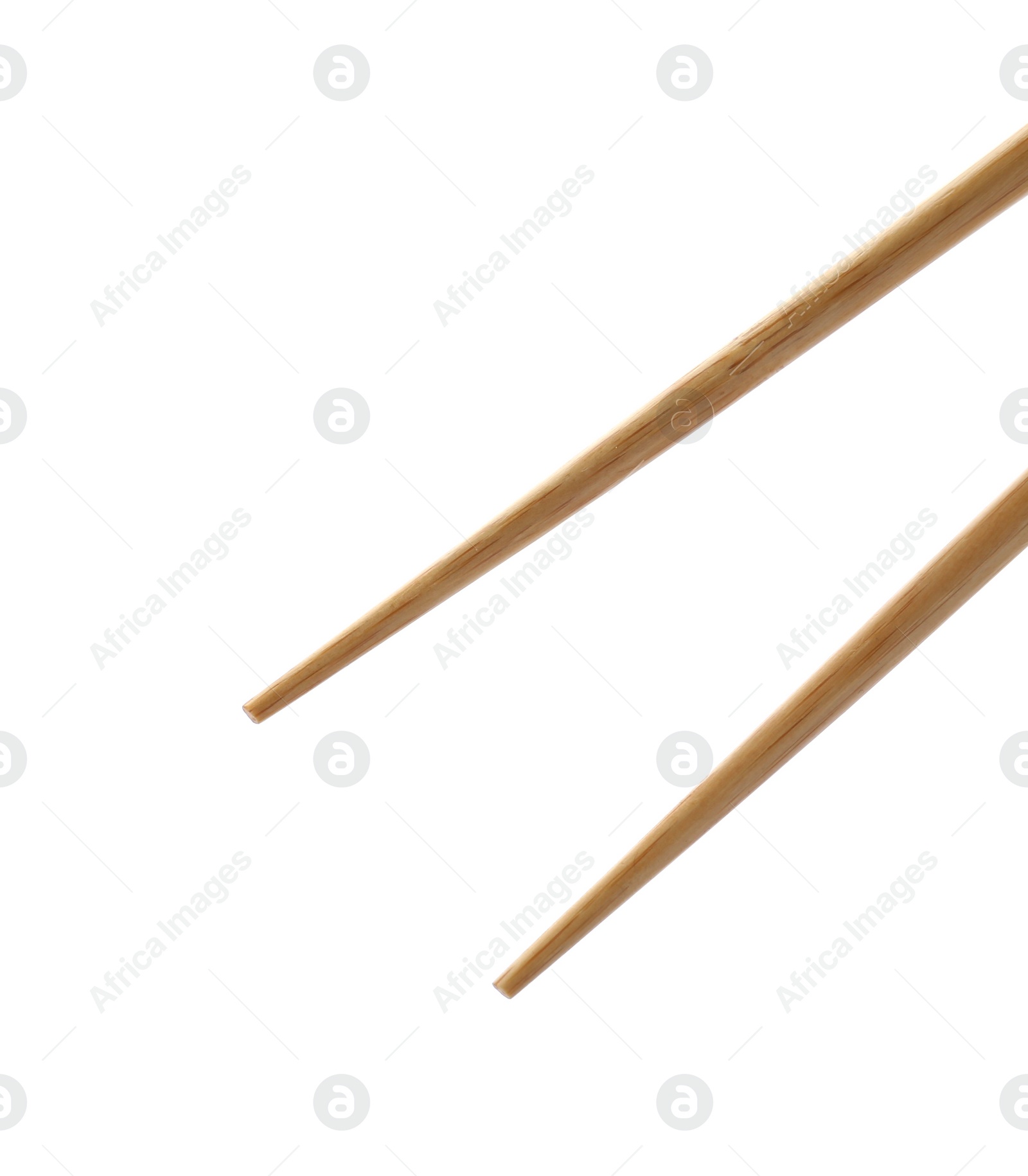 Photo of Pair of wooden chopsticks isolated on white