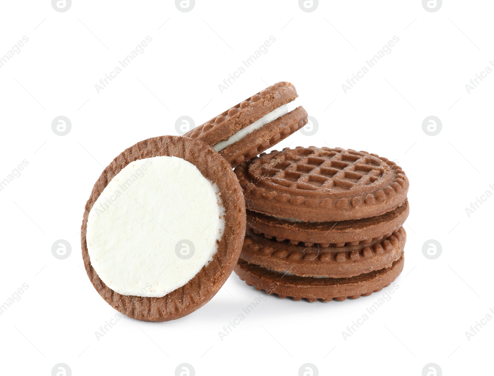 Photo of Tasty chocolate sandwich cookies with cream on white background