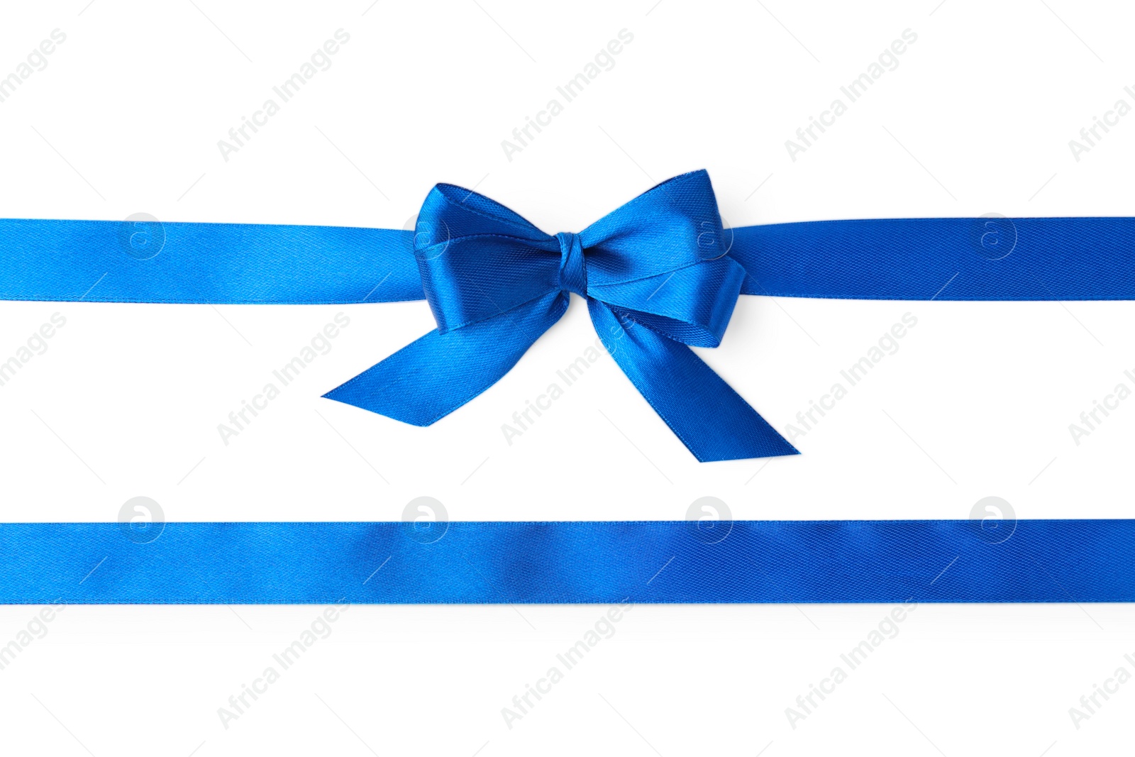 Photo of Blue satin ribbons with bow on white background, top view