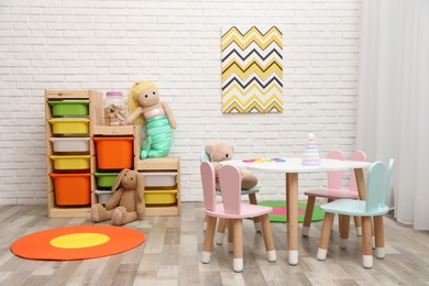 Child's room interior with stylish furniture and toys