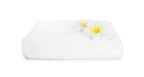 Photo of Terry towel and plumeria flowers isolated on white