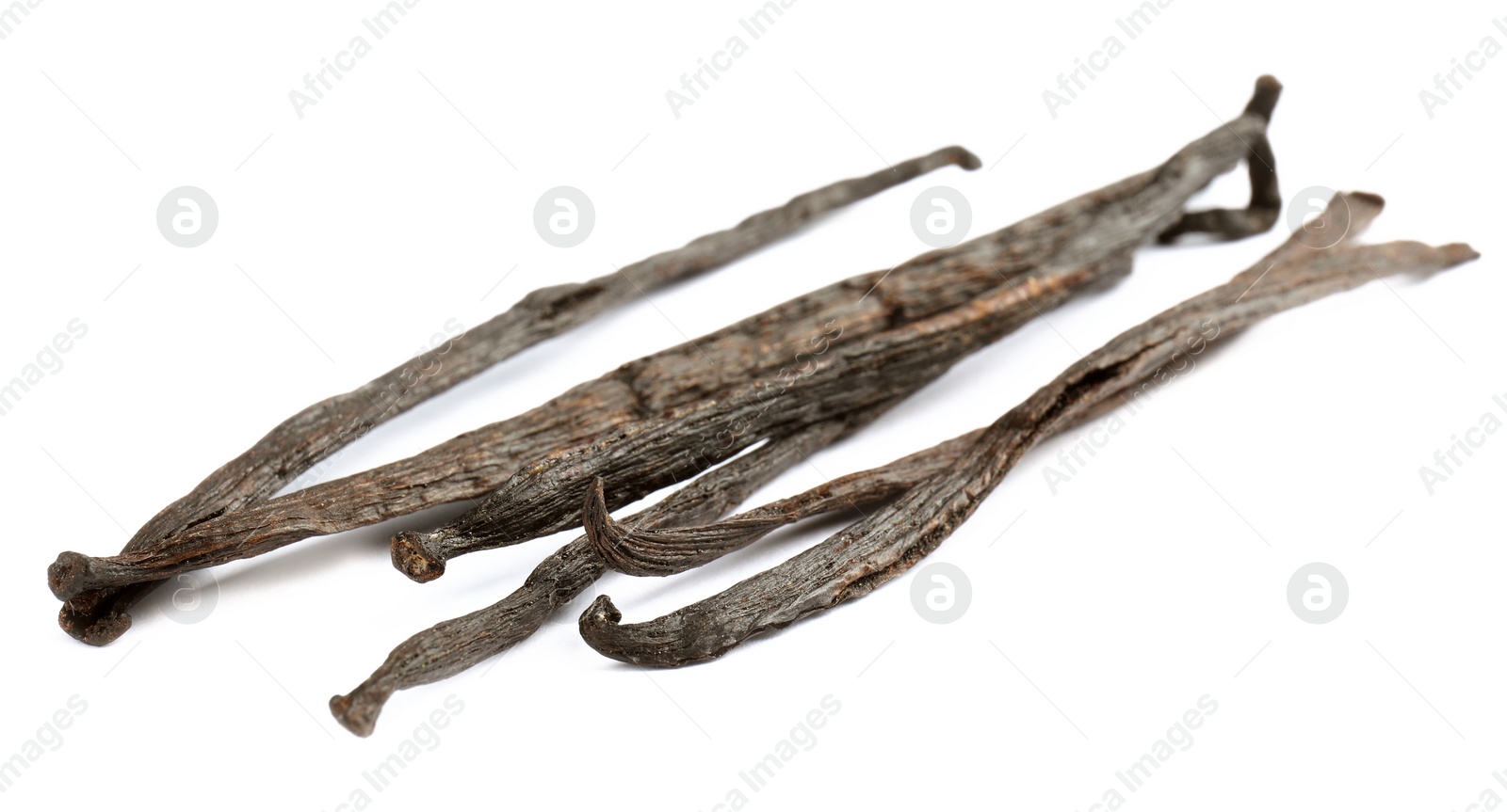 Photo of Dried aromatic vanilla sticks on white background