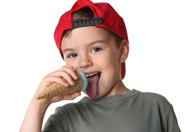 Adorable little boy with delicious ice cream on white background, closeup