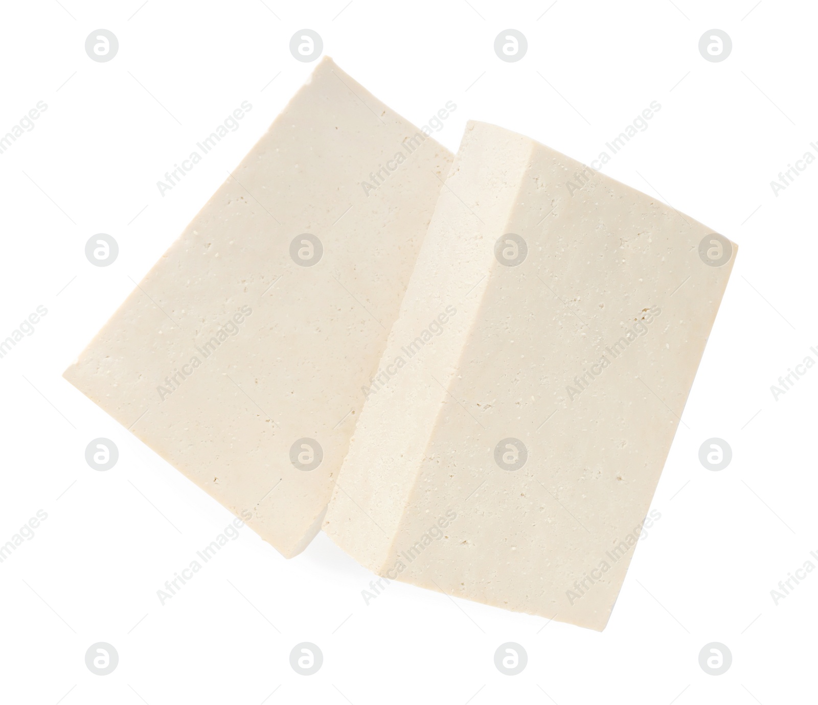 Photo of Blocks of delicious raw tofu on white background, top view