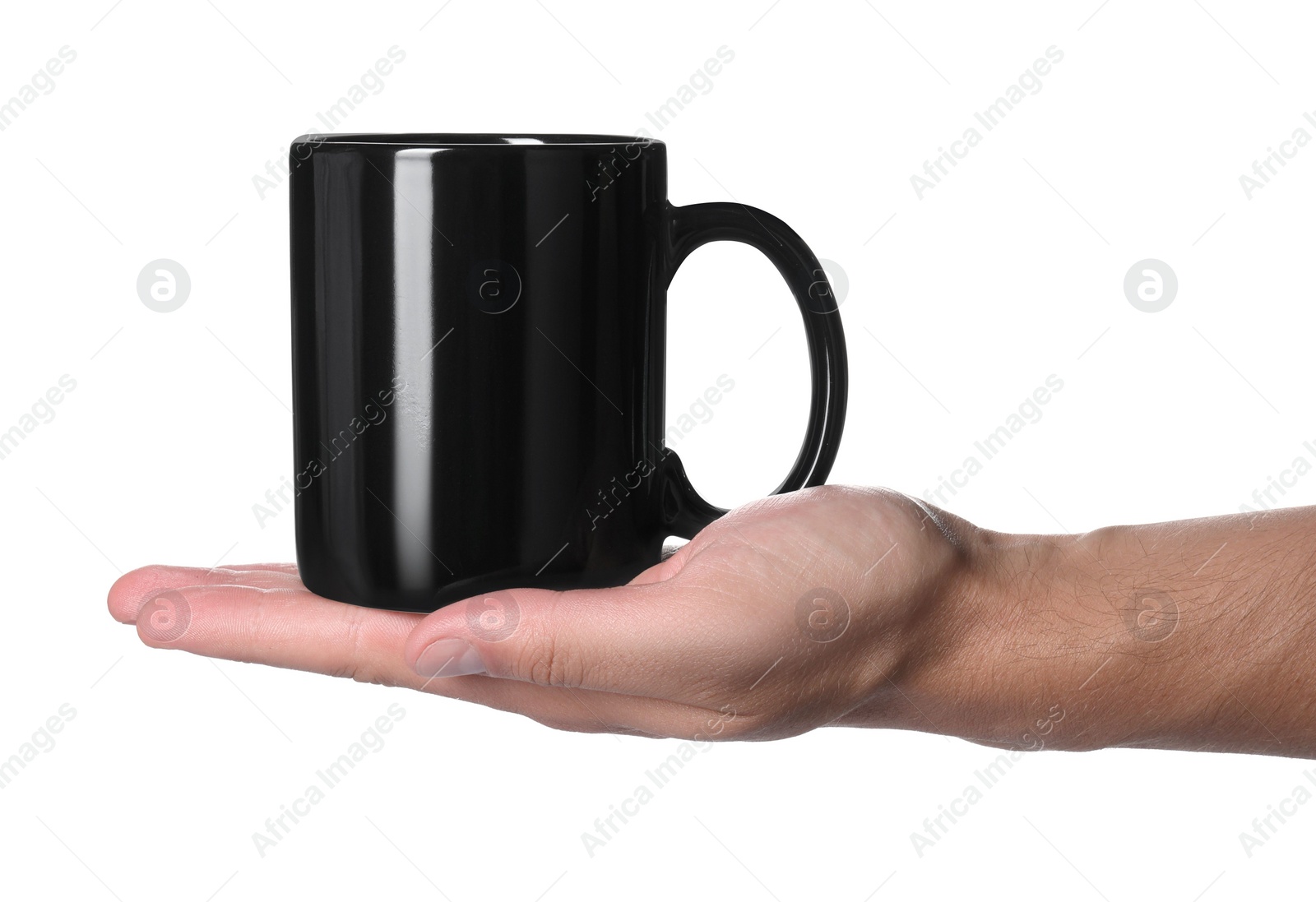 Photo of Man holding black mug on white background, closeup