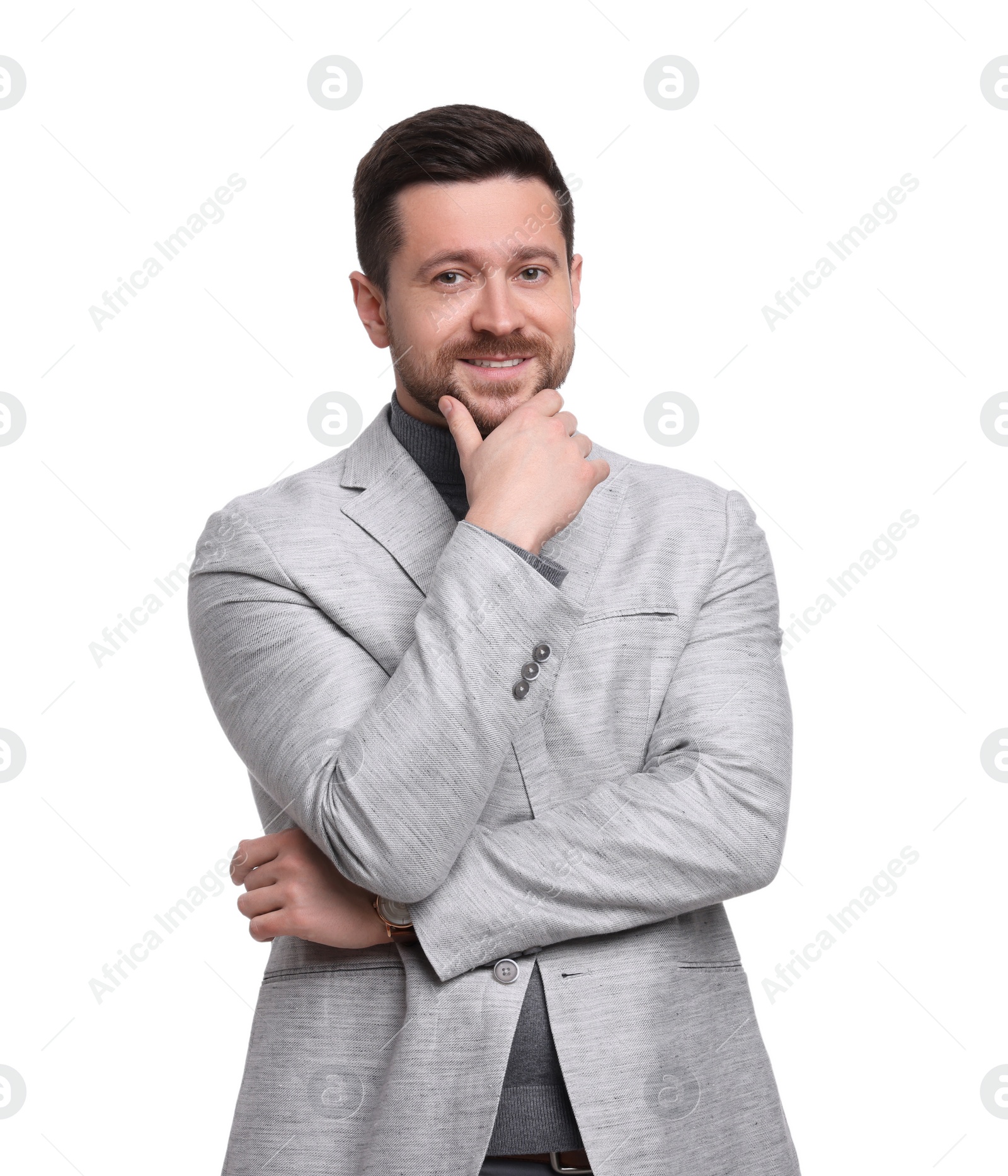 Photo of Handsome bearded businessman in suit on white background