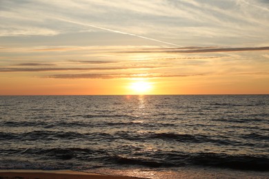 Photo of Picturesque view of sea at sunset. Tropical beach