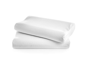 Photo of Clean soft orthopedic pillows on white background