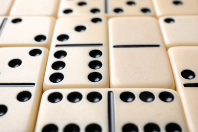 Set of classic domino tiles as background, closeup