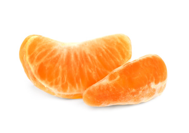 Fresh juicy tangerine segments isolated on white