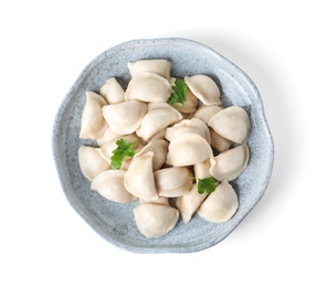 Plate of tasty cooked dumplings isolated on white, top view