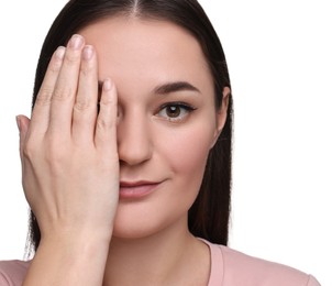 Photo of Beautiful woman covering her eye on white background