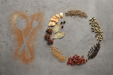 Frame of different spices and silhouettes of cutlery on grey textured table, flat lay. Space for text