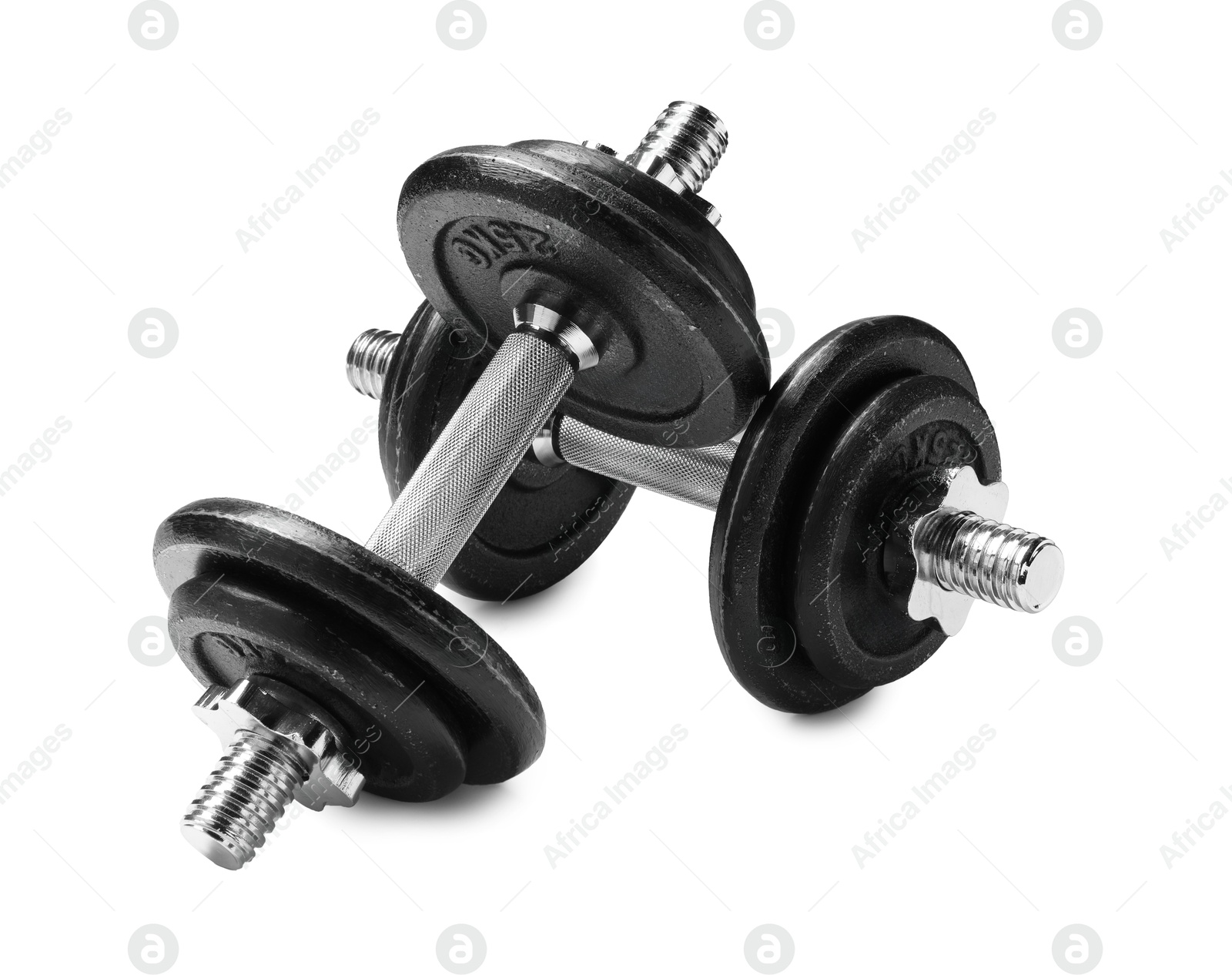 Photo of Metal dumbbells isolated on white. Sports equipment